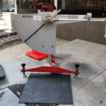 A side-by-side close-up of two tiles: light matt P4 and dark polished P2, with pendulum slider between them.