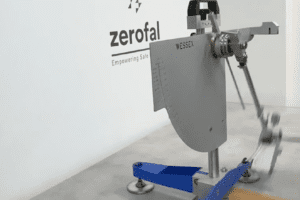 Tile sample undergoing wet pendulum slip resistance testing in laboratory using Wessex Portable Skid Resistance Tester with red base