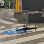 Wet pendulum slip resistance testing on a painted pedestrian surface in a car park walkway.
