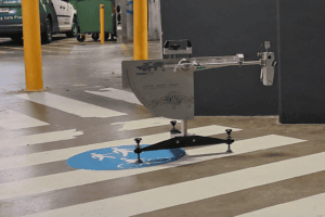 Slip Testing for Legal and Risk Reports 1 Wet pendulum slip resistance testing on a painted pedestrian surface in a car park walkway.